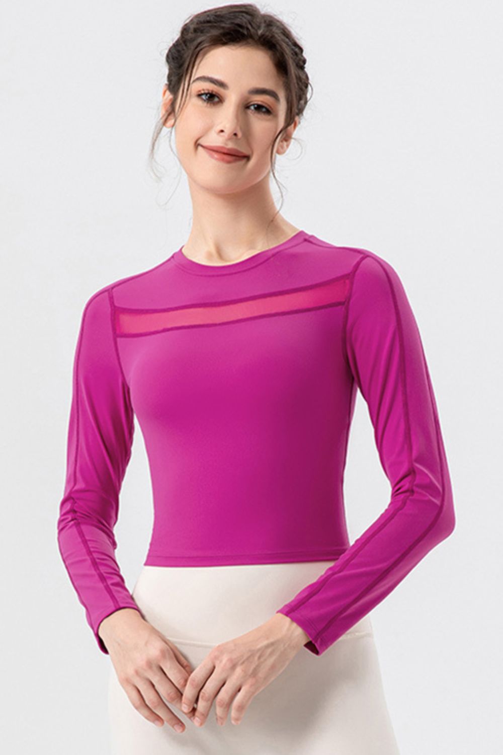 Red-Violet mesh panel performance crop top with long sleeves and crew neck.