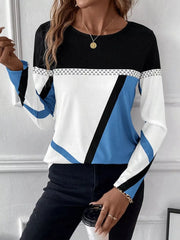 Geometric panel long sleeve t-shirt with black, white, and sky blue color blocking.