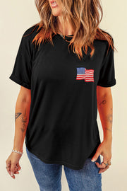 Black t-shirt with rolled sleeves and an embroidered American flag detail on the chest.