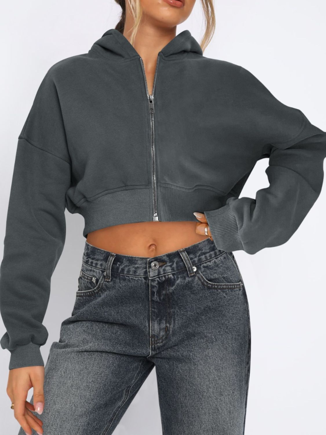 Dark gray cropped zip-up hoodie with ribbed hem and cuffs.
