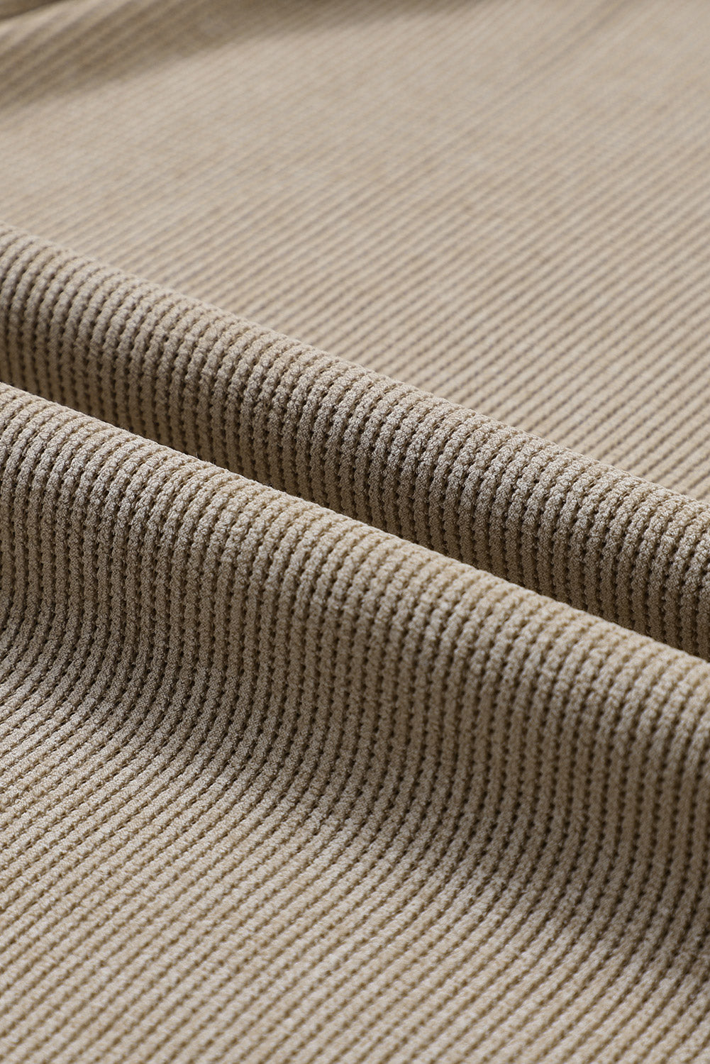 Tan ribbed sweatshirt fabric detail