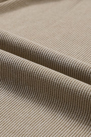 Tan ribbed sweatshirt fabric detail