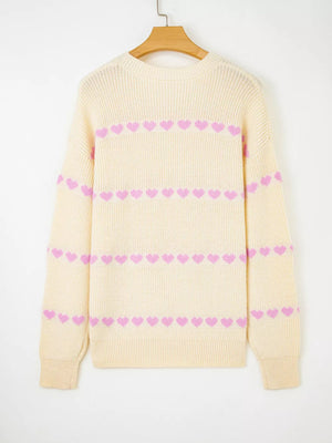 Cream acrylic blend knit sweater with pink heart stripes, crew neck, long sleeves.
