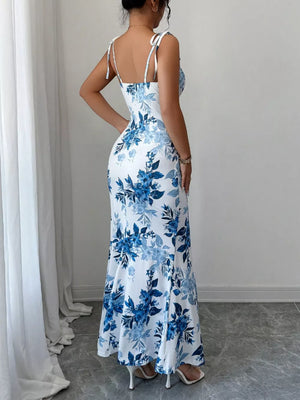Floral print maxi dress in Peacock Blue with tie straps and a flared hem.