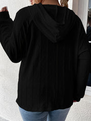 Black textured knit raglan hoodie with cable knit detail.