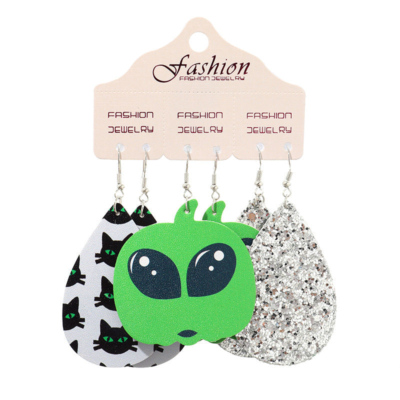 Halloween dangle earrings set with alien, black cat, and glitter designs.