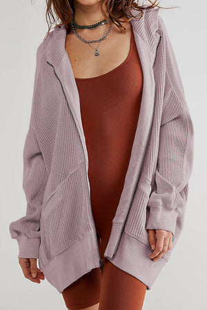 Lilac waffle knit zip-through hoodie with a relaxed fit and hood.