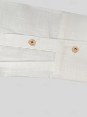 Men's white button-up shirt with wooden buttons and a textured fabric detail.