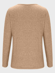 Tan long sleeve tee with a subtle textured knit and a wide neckline.