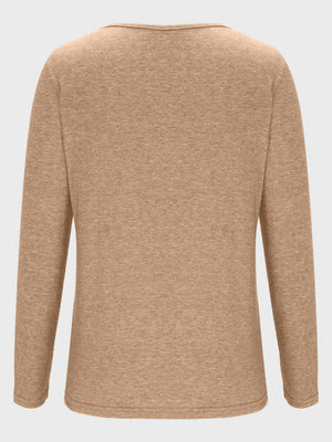 Tan long sleeve tee with a subtle textured knit and a wide neckline.