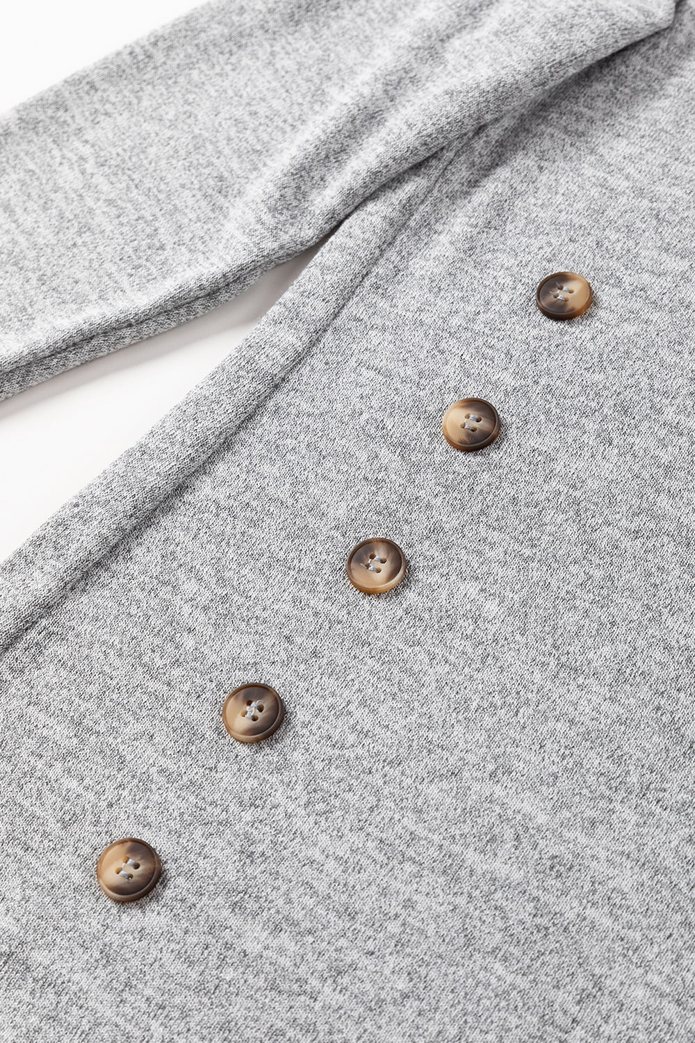 Dark gray slouchy knit top with side button detail