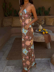 Brown celestial print maxi cami dress with spaghetti straps and a V-neck.