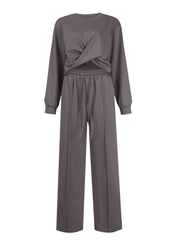 Cross-front knit lounge set in dark gray with drawstring wide-leg pants.