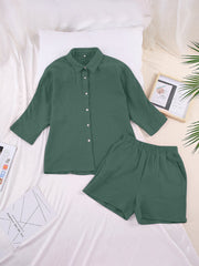 Dark green gauze cotton resort shirt and shorts set with button front and elastic waist shorts.