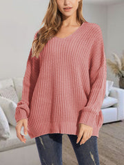 Relaxed fit ribbed knit sweater in Dusty Pink with V-neck and batwing sleeves.