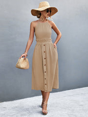 Khaki button-down midi dress with halter neck, ruffled waist, and A-line skirt.