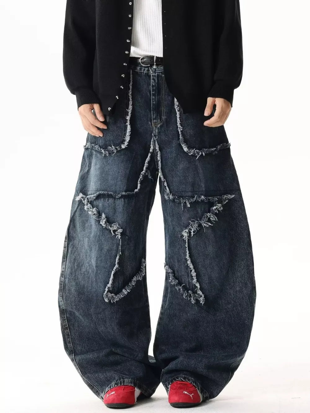 Star Patchwork Distressed Wide Leg Jeans in dark wash denim with frayed details.