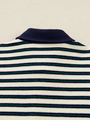 Striped polo top with navy contrast collar and zipper detail