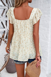 Cream floral peplum blouse with flutter sleeves and square neckline