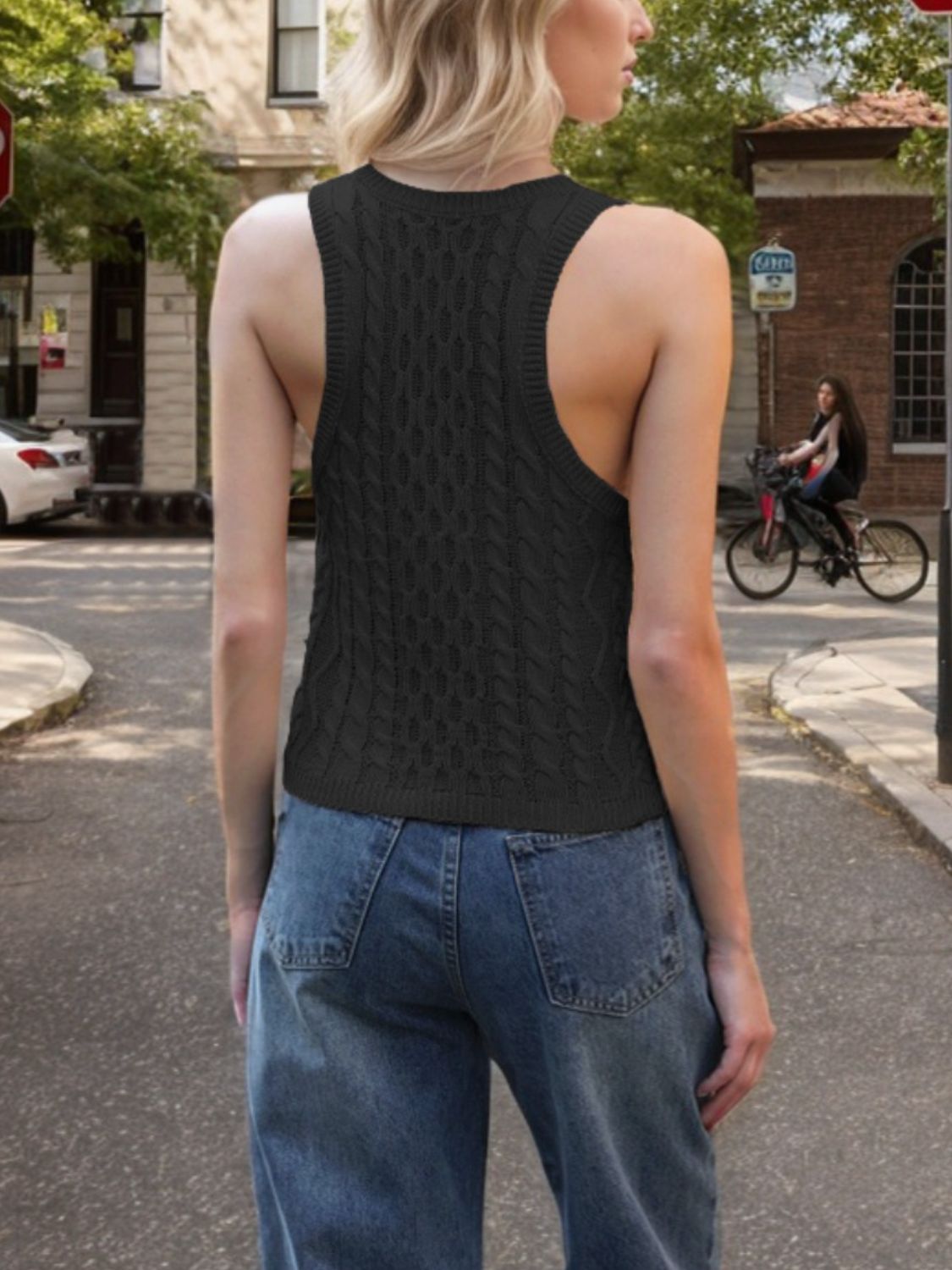 Black cable knit tank top with a racerback cut.