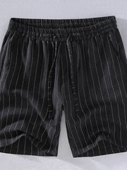 Black pinstripe chino shorts with drawstring waist and pockets.