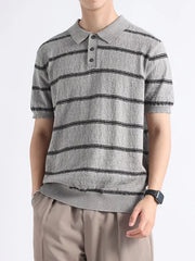 Men's gray knit polo with black horizontal stripes and button accents.