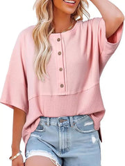 Pink waffle-knit t-shirt with button detail and textured hem