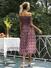 Burgundy floral off-shoulder midi dress with smocked bodice and a side slit.