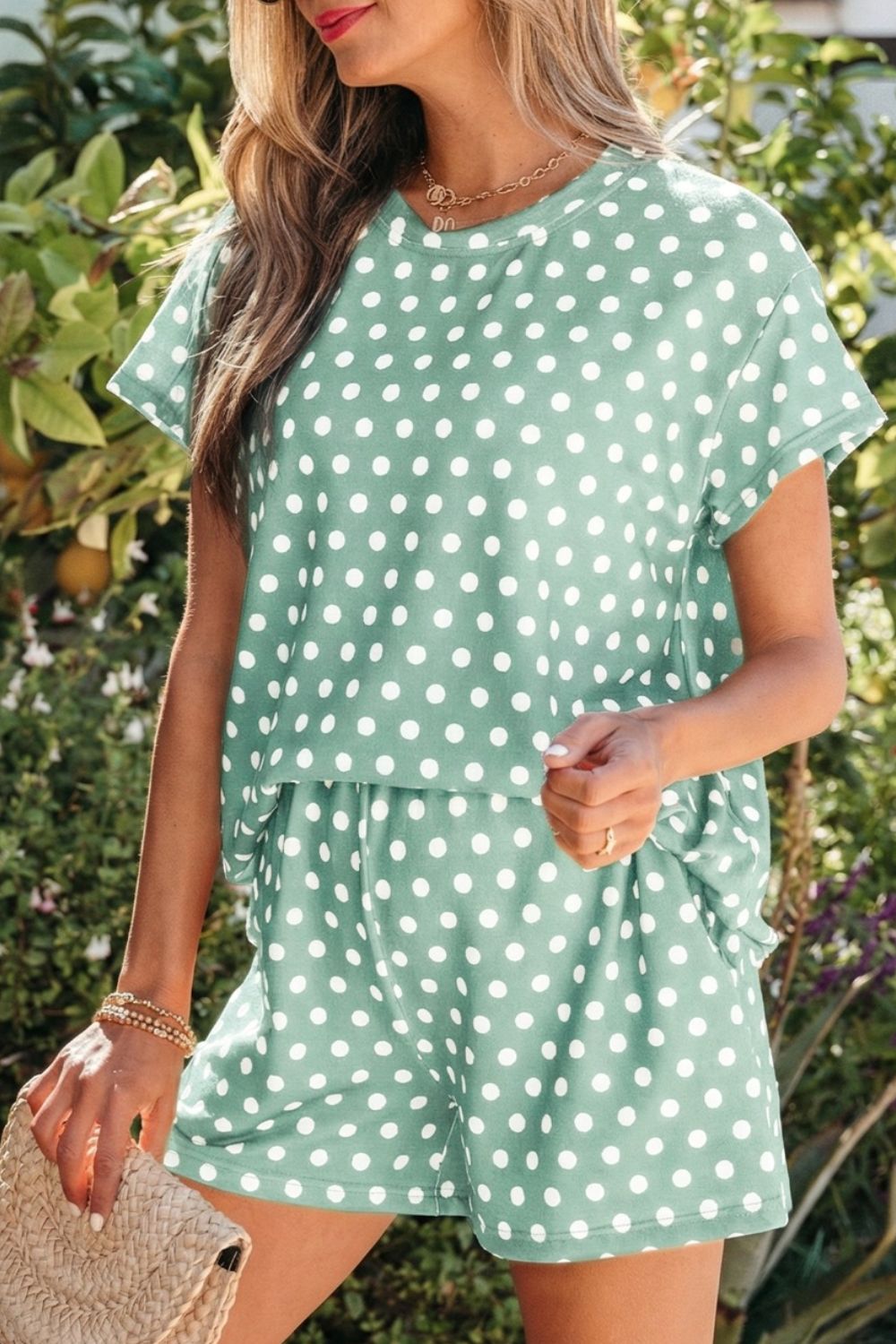 Green polka dot pajama set with crew neck top and shorts