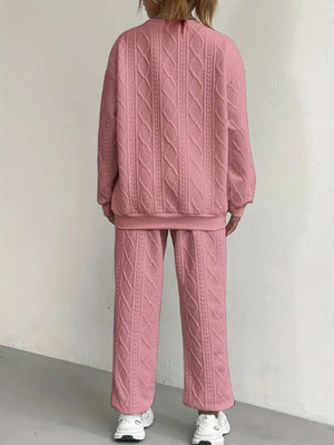 Dusty Pink cable knit loungewear set with crewneck sweatshirt and straight leg pants.