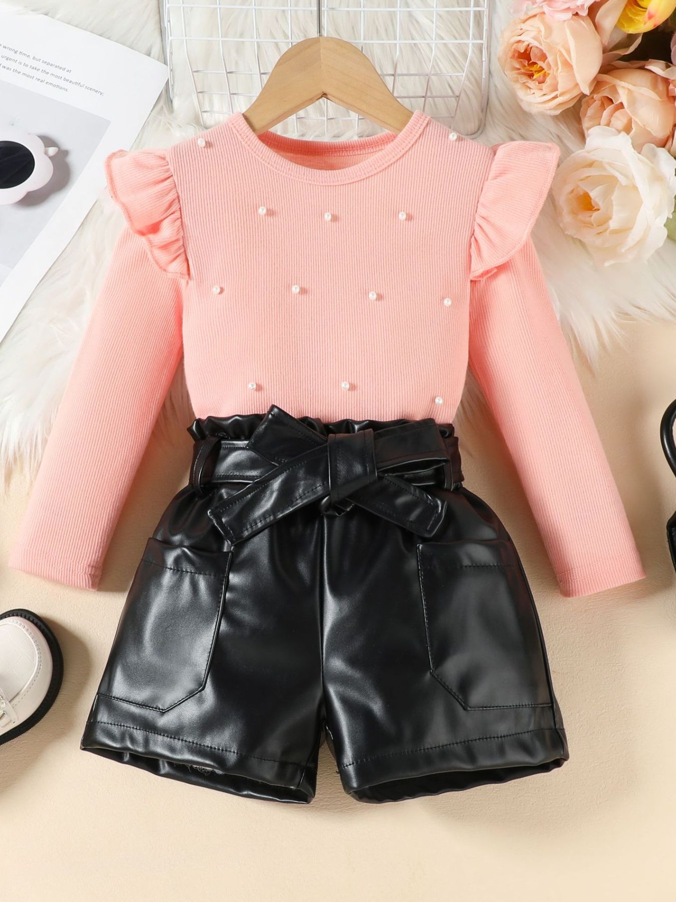 Pink ruffled pearl top with faux leather shorts set
