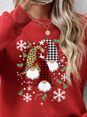Red raglan sweatshirt with festive gnome graphic, snowflakes, and holly.