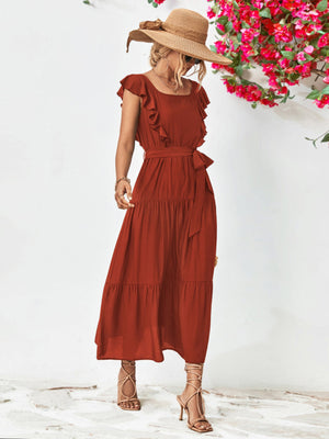 Flutter sleeve tiered midi dress in brick red with ruffle detail and belt.
