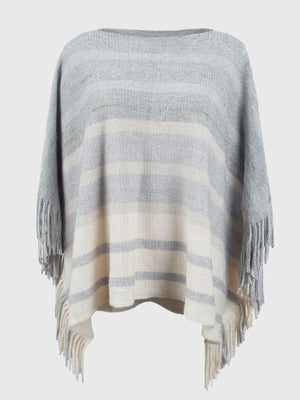 Striped knit poncho in ivory and charcoal with a boat neck and fringe trim.