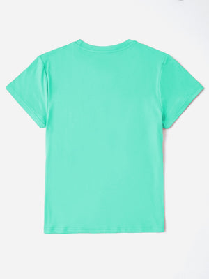 Aqua t-shirt with iridescent heart and cross appliqué detail on front.