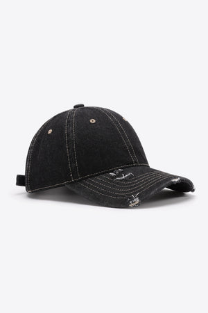 Black distressed baseball cap with contrast stitching and adjustable strap