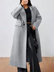Longline gray wool-blend overcoat with button closure and flap pockets.