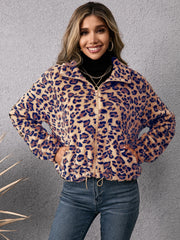Leopard print sherpa bomber jacket with zip-up front and drawstring hem.