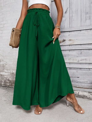 Dark green ruffled waistline palazzo trousers with drawstring and wide leg.