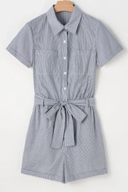 Pinstripe shirred waist romper with tie, short sleeves, collared, button front, two chest pockets.