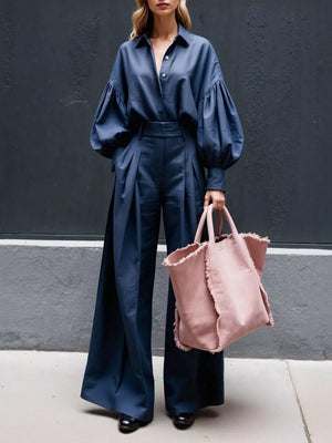 Blue lantern sleeve button-up shirt and wide-leg pants set with pleated detail.