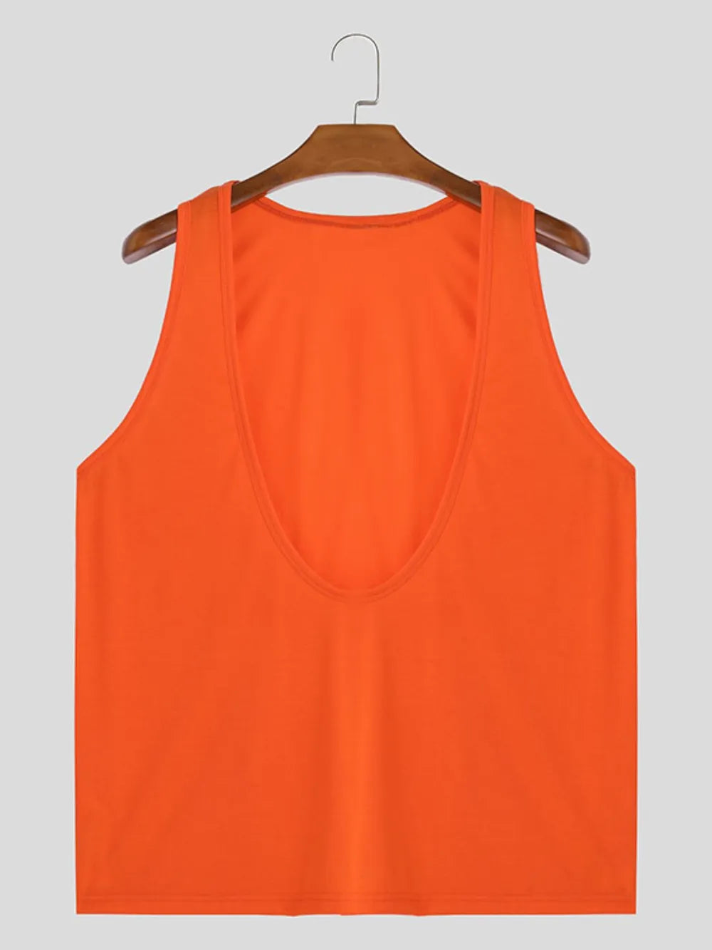 Orange deep plunge tank top with a wide neckline and sleeveless design.