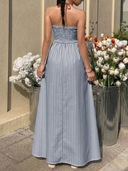 Blue striped halter maxi dress with smocked bodice and a-line skirt