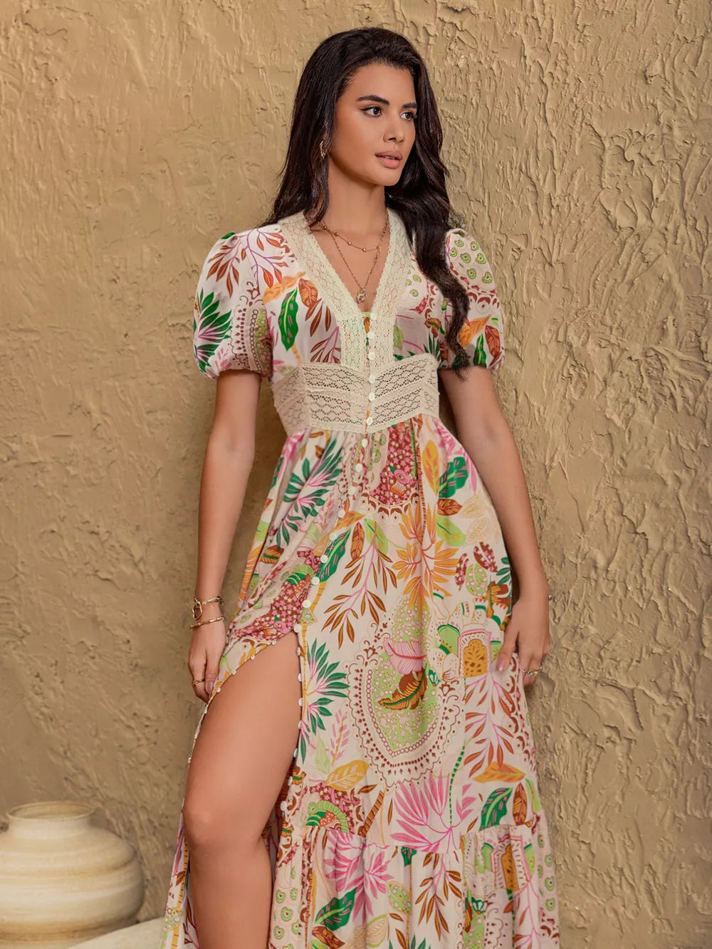 Tropical floral maxi dress with lace trim, button front, V-neck, short sleeves, and high slit.