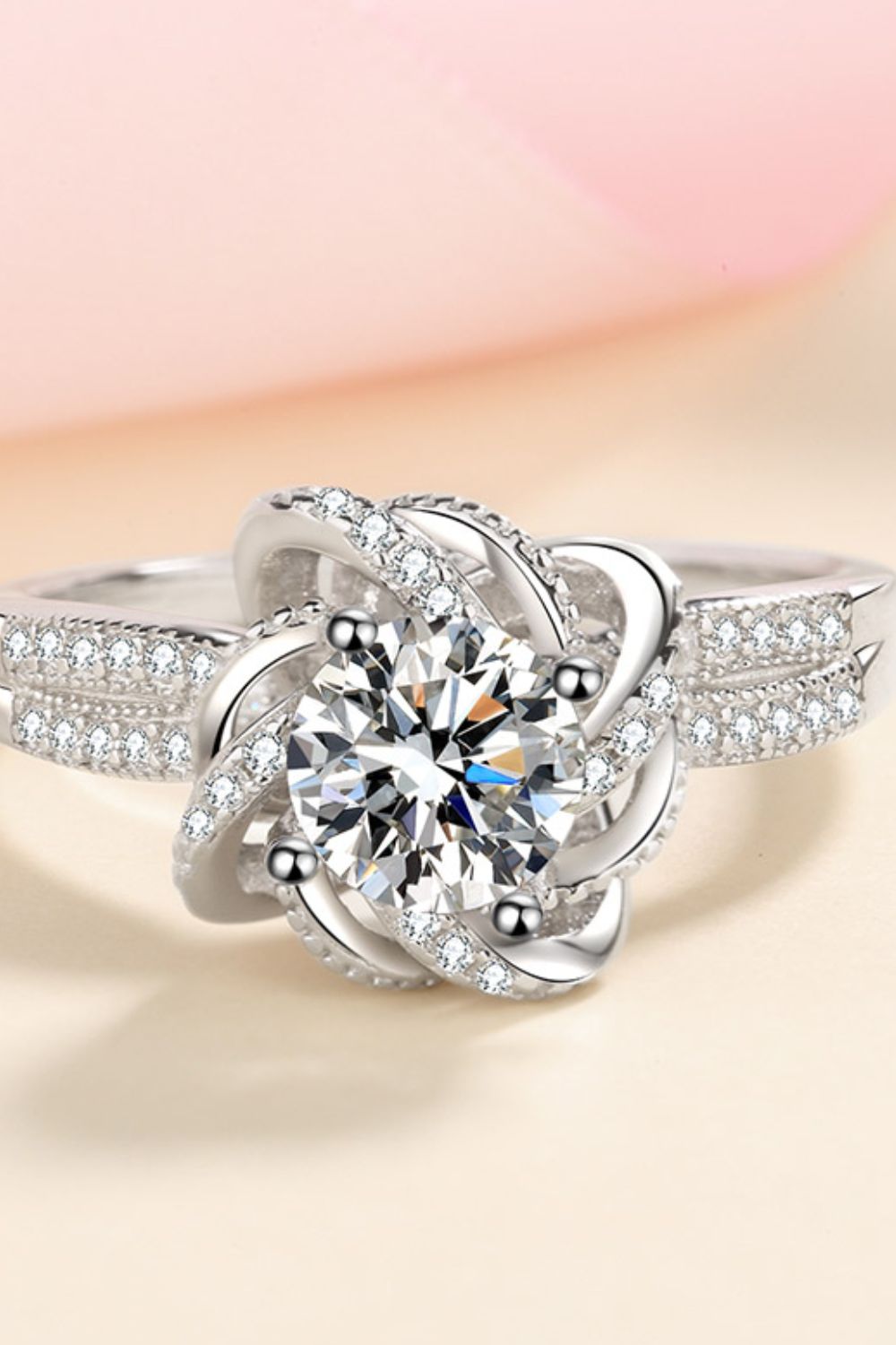 Silver ring with floral halo moissanite and pave diamond band