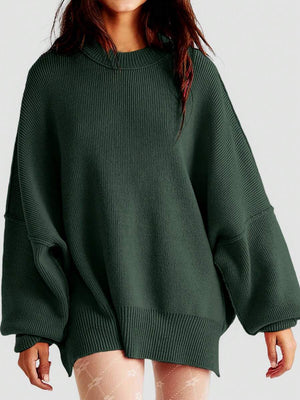 Oversized ribbed knit sweater in dark green with drop shoulders and crew neck.