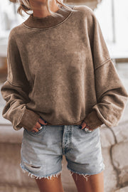 Acid wash mock neck sweatshirt in taupe with ribbed cuffs and neckline.