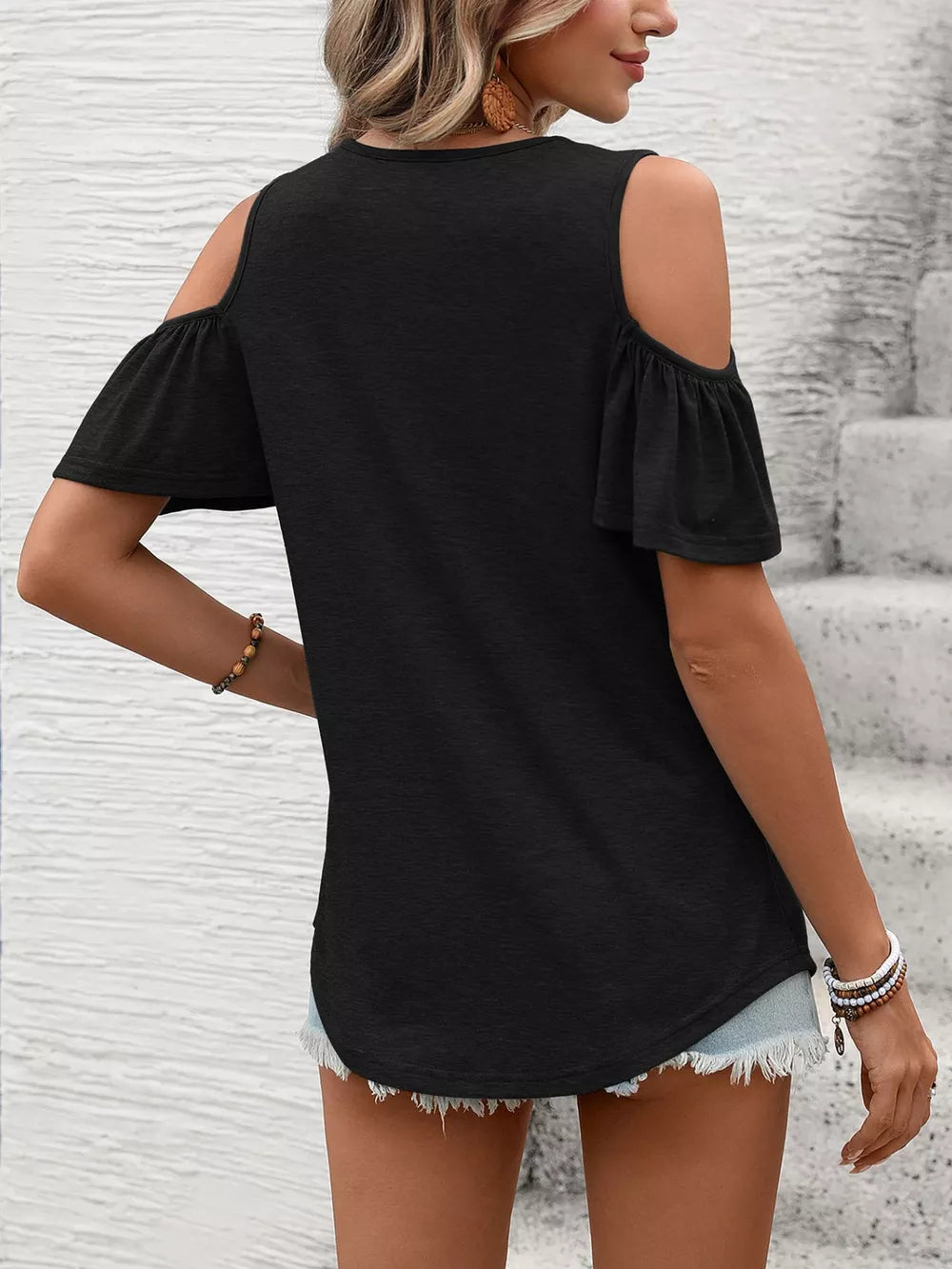 Black ruched cold shoulder t-shirt with flutter sleeves and a curved hem