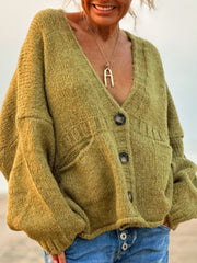 Textured bouclé oversized button-down cardigan in lime with V-neck and patch pockets.
