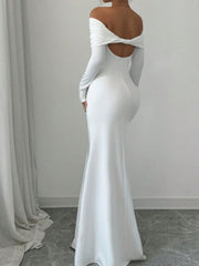 White off-shoulder bodycon maxi dress with draped neckline and cutout back.